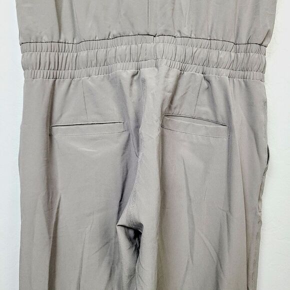 Albion Fit Jumpsuit XS Beige Stretch Cap Sleeve Cinch Waist Ankle‎ Zip One Piece - Picture 5 of 8